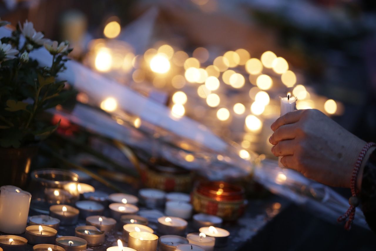 People lit hundreds of candles for the victims of the Paris attacks at the Place de la Republique. Similar tributes were carried out across France and the rest of the world.