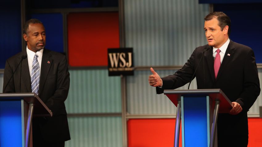 Presidential candidate Sen. Ted Cruz (R-TX) speaks while Ben Carson looks on the during the Republican Presidential Debate sponsored by Fox Business and the Wall Street Journal at the Milwaukee Theatre November 10, 2015 in Milwaukee, Wisconsin. 