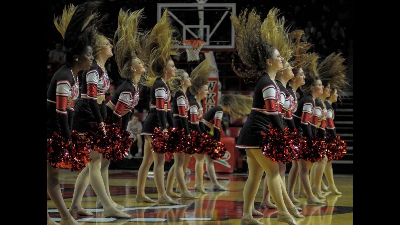 The Topperettes, dancers from Western Kentucky University, perform during a timeout of a basketball game Saturday, November 14, in Bowling Green, Kentucky.
