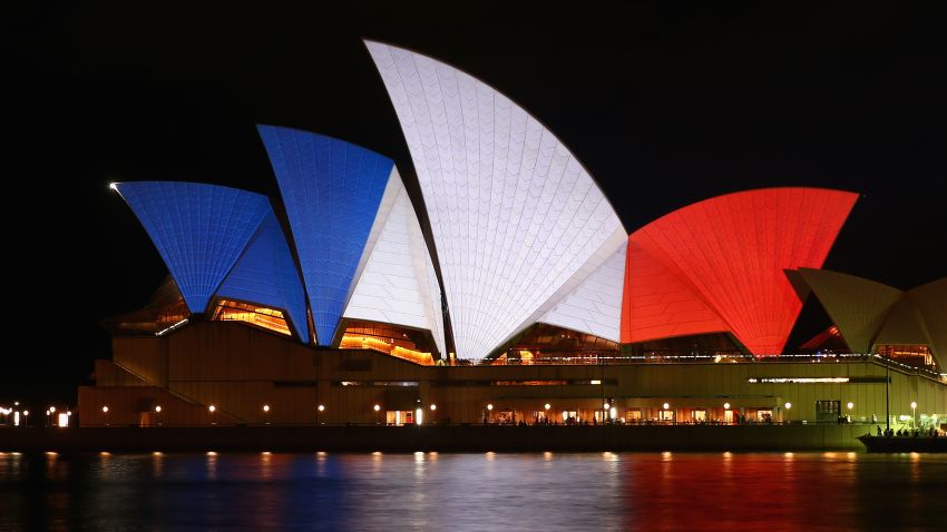 SYDNEY, AUSTRALIA - NOVEMBER 14:  The sails of the Sydney Opera House are illuminated in the colours of the French flag on November 14, 2015 in Sydney, Australia. At least 120 people have been killed and over 200 are injured in Paris following a series of terrorist acts in the French capital on Friday.  (Photo by Cameron Spencer/Getty Images)