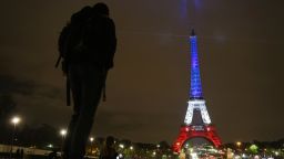 A photo taken on November 16, 2015 in Paris shows the Eiffel Tower illuminated with the colors of the French flag, in tribute to the victims of the November 13 Paris terror attacks. Islamic State jihadists claimed a series of coordinated attacks by gunmen and suicide bombers in Paris that killed at least 129 people in scenes of carnage at a concert hall, restaurants and the national stadium. AFP PHOTO / LUDOVIC MARIN        (Photo credit should read LUDOVIC MARIN/AFP/Getty Images)