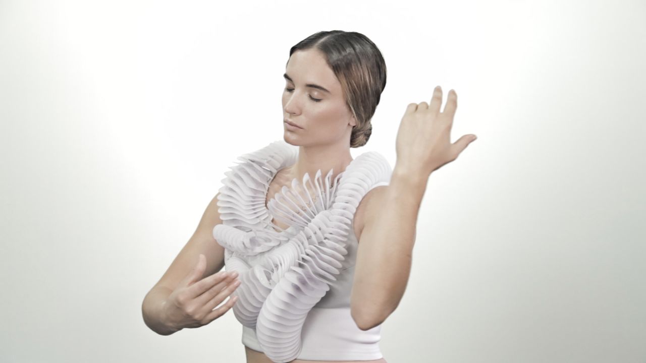 With designer Pauline van Dongen, she created <em>Ruff</em>, a spring-loaded 3-D-printed garment that coils around the body.