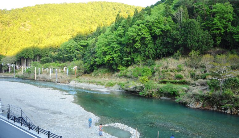 Three ancient onsen villages are located in Tanabe. At Kawayu Onsen (pictured), holes dug along the river have created natural outdoor bathing areas. 
