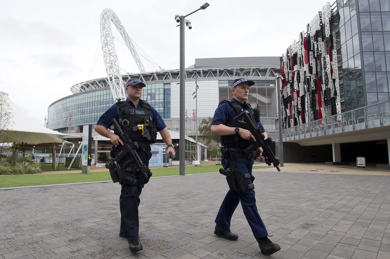Earlier Tuesday, armed British police officers patrolled around Wembley Stadium.