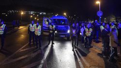 CORRECTING CITY
Police secures the area as supporters leave the stadium after the friendly football match Germany vs the Netherlands was called off for 'security reasons' in Hannover on November 17, 2015.   AFP PHOTO / ODD ANDERSEN        (Photo credit should read ODD ANDERSEN/AFP/Getty Images)