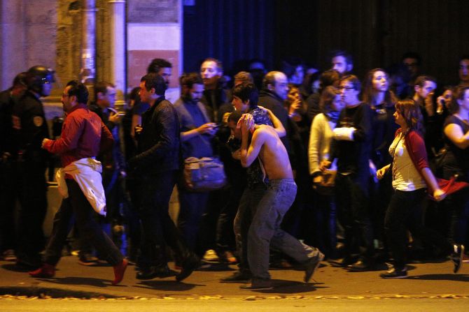 Wounded people are helped outside the Bataclan concert hall in Paris following a series of coordinated attacks in the city on Friday, November 13. The militant group ISIS claimed responsibility <a href="index.php?page=&url=http%3A%2F%2Fwww.cnn.com%2F2015%2F11%2F13%2Fworld%2Fgallery%2Fparis-attacks%2Findex.html" target="_blank">for the attacks,</a> which killed at least 130 people and wounded hundreds more.