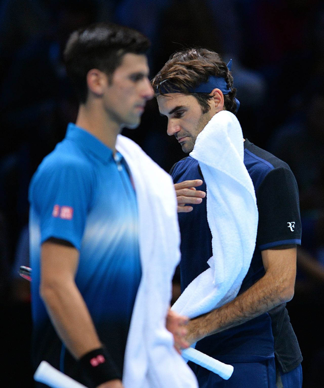 Novak Djokovic, left, and Roger Federer renewed their rivalry at the World Tour Finals on Tuesday. 