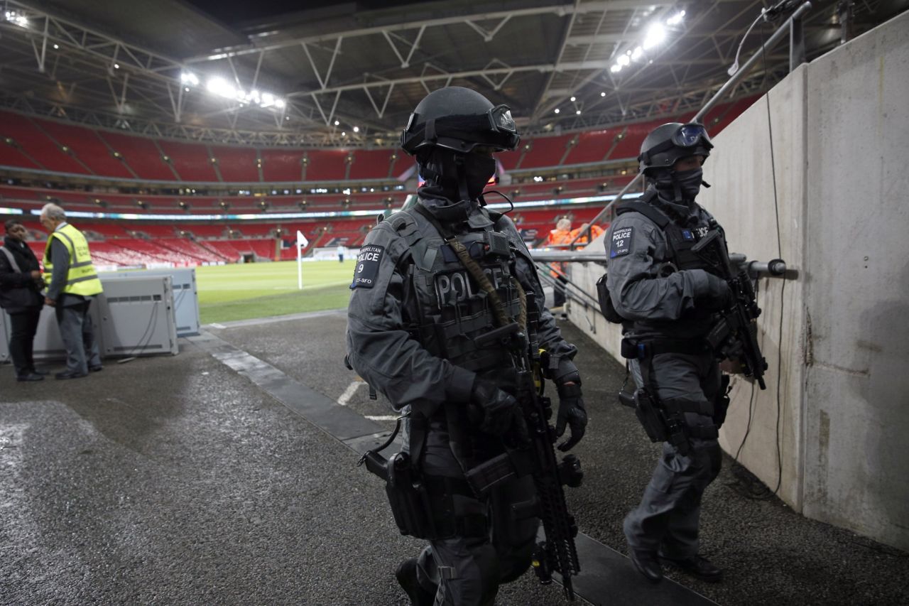 British counter terror specialist firearms officers (CTSFO) patrol inside Wembley ahead of the friendly match.