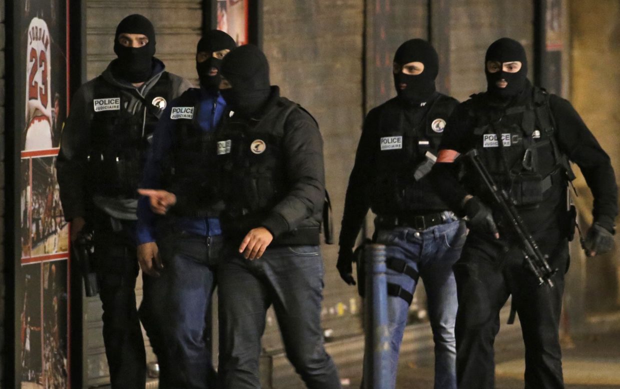 Members of the French police take up position.