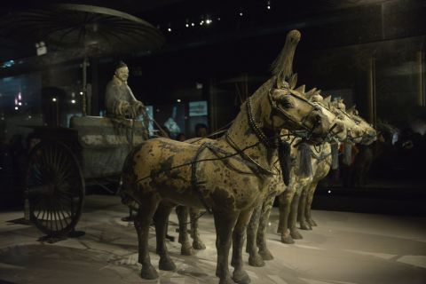 Near the Terra-cotta Army, Chinese archaeologists discovered hundreds of pits with buried funeral treasures. This bronze chariot excavated in 1980 highlights the metallurgical technology in the Qin Dynasty. It's believed it was meant to serve as the emperor's ride into the afterlife.