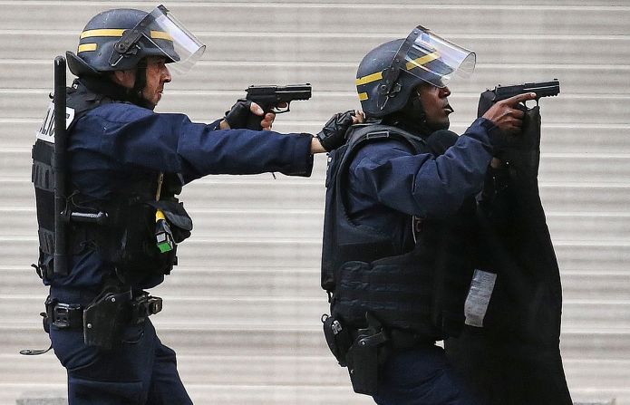 Police forces operate in Saint-Denis on November 18.