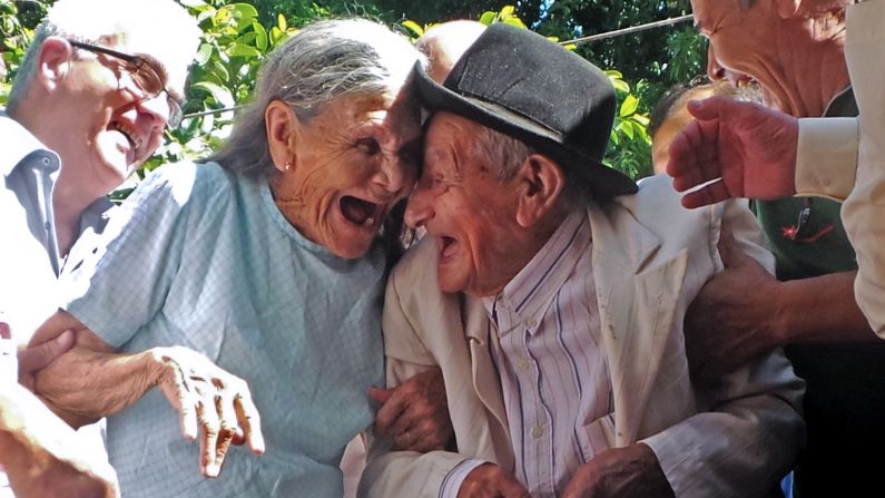 Anacleto Escobar and his wife, Cayetana Roman, laugh at a ceremony commemorating his 100th birthday Wednesday, January 7, in Neembucu, Paraguay. Escobar, a veteran of the Chaco War that was fought between Paraguay and Bolivia in the 1930s, was given a house as a gift. He and his wife had never owned their own home before.
