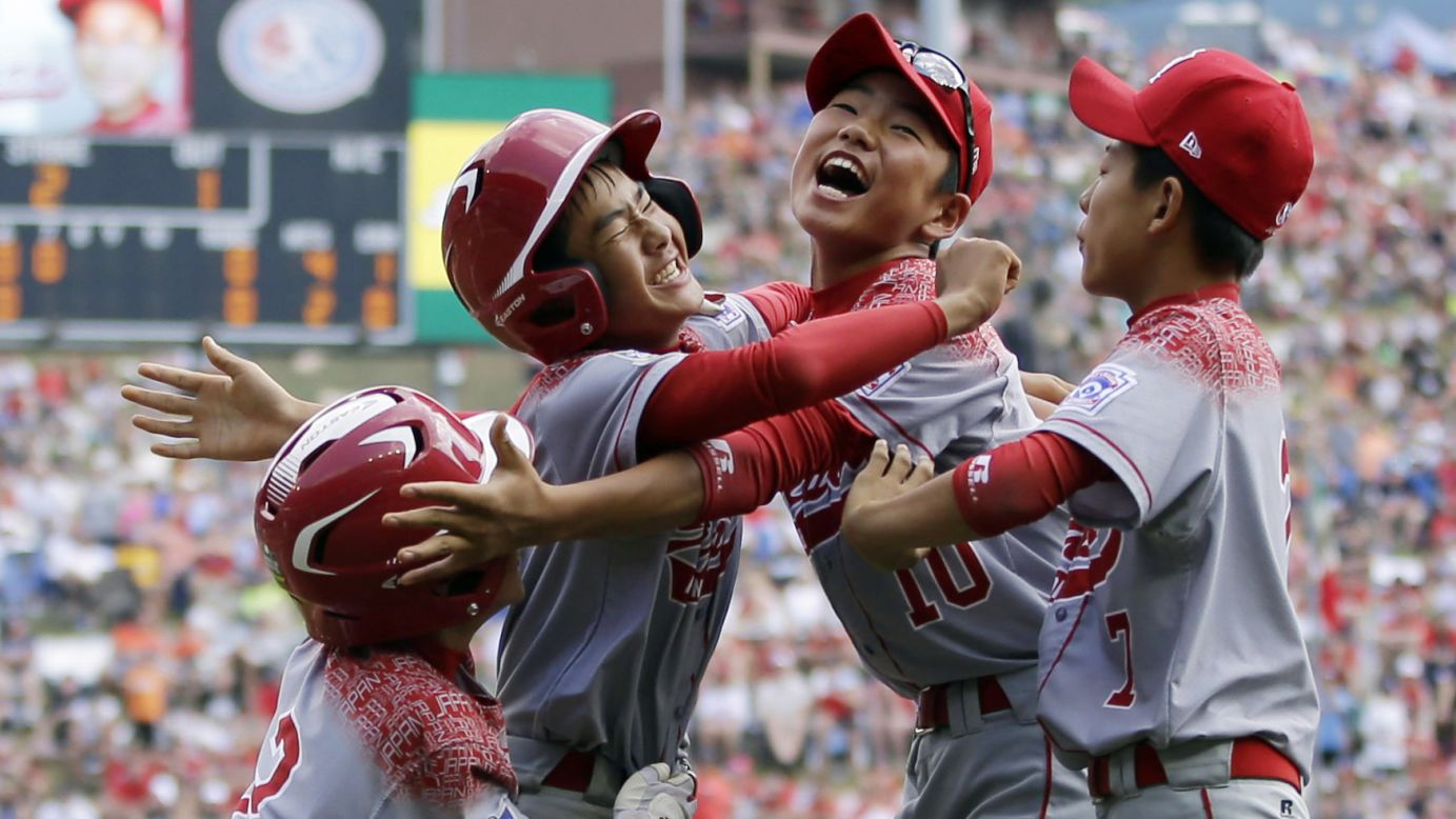 Little League baseball players from Japan celebrate after a game-winning hit to defeat Mexico on Saturday, August 29. The team would go on to beat a team from Pennsylvania and win the tournament.