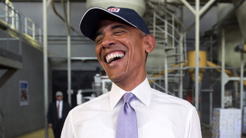 U.S. President Barack Obama laughs at the hairnets that members of the press had to wear while touring a food factory in Addis Ababa, Ethiopia, on Tuesday, July 28.