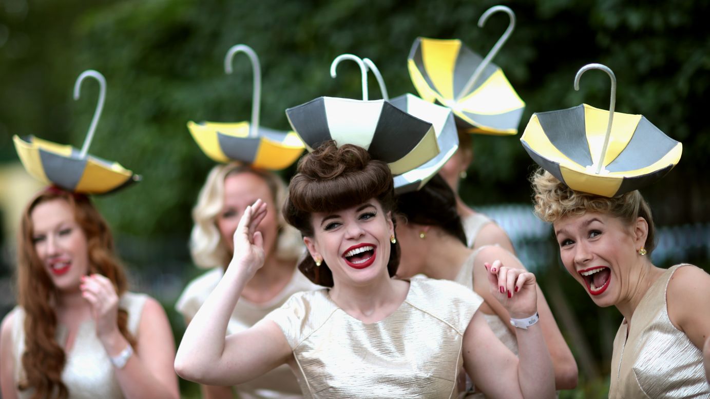 The Tootsie Rollers, an all-girl band from London, attend the Royal Ascot horse races in Ascot, England, on Wednesday, June 17.