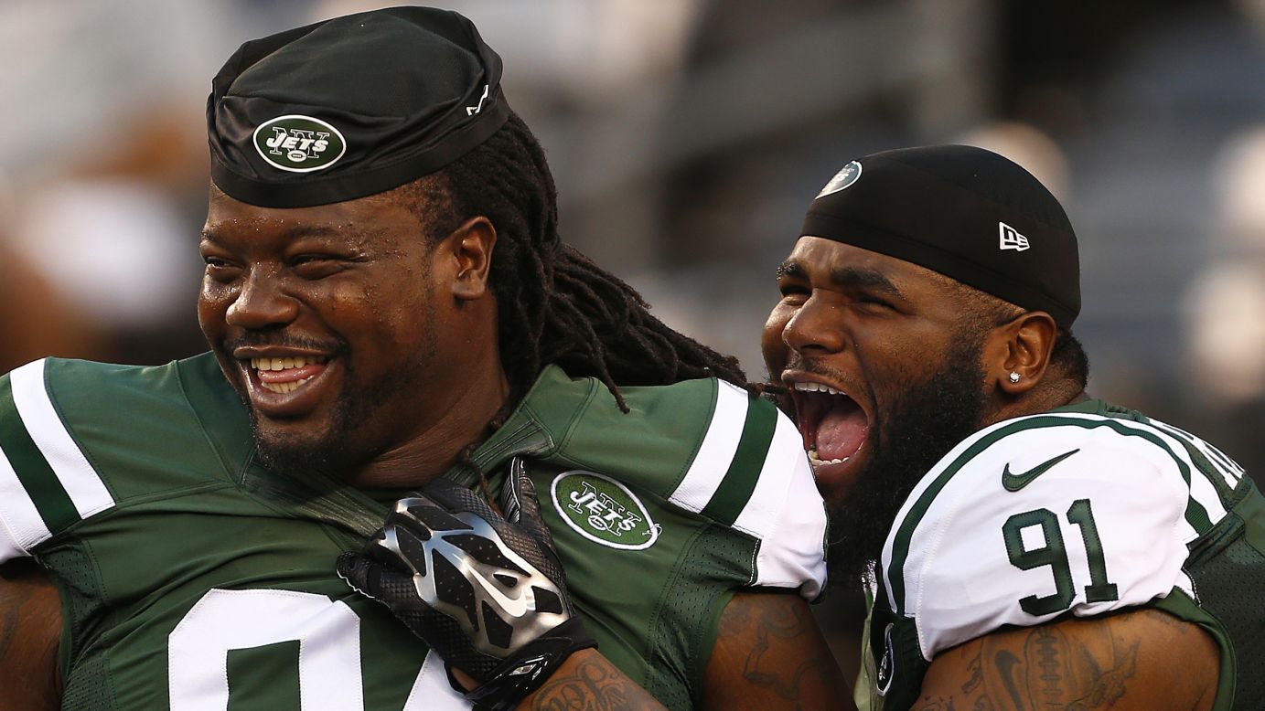 Two New York Jets -- Damon Harrison, left, and Sheldon Richardson -- laugh before an NFL preseason game in East Rutherford, New Jersey, on Thursday, September 3.