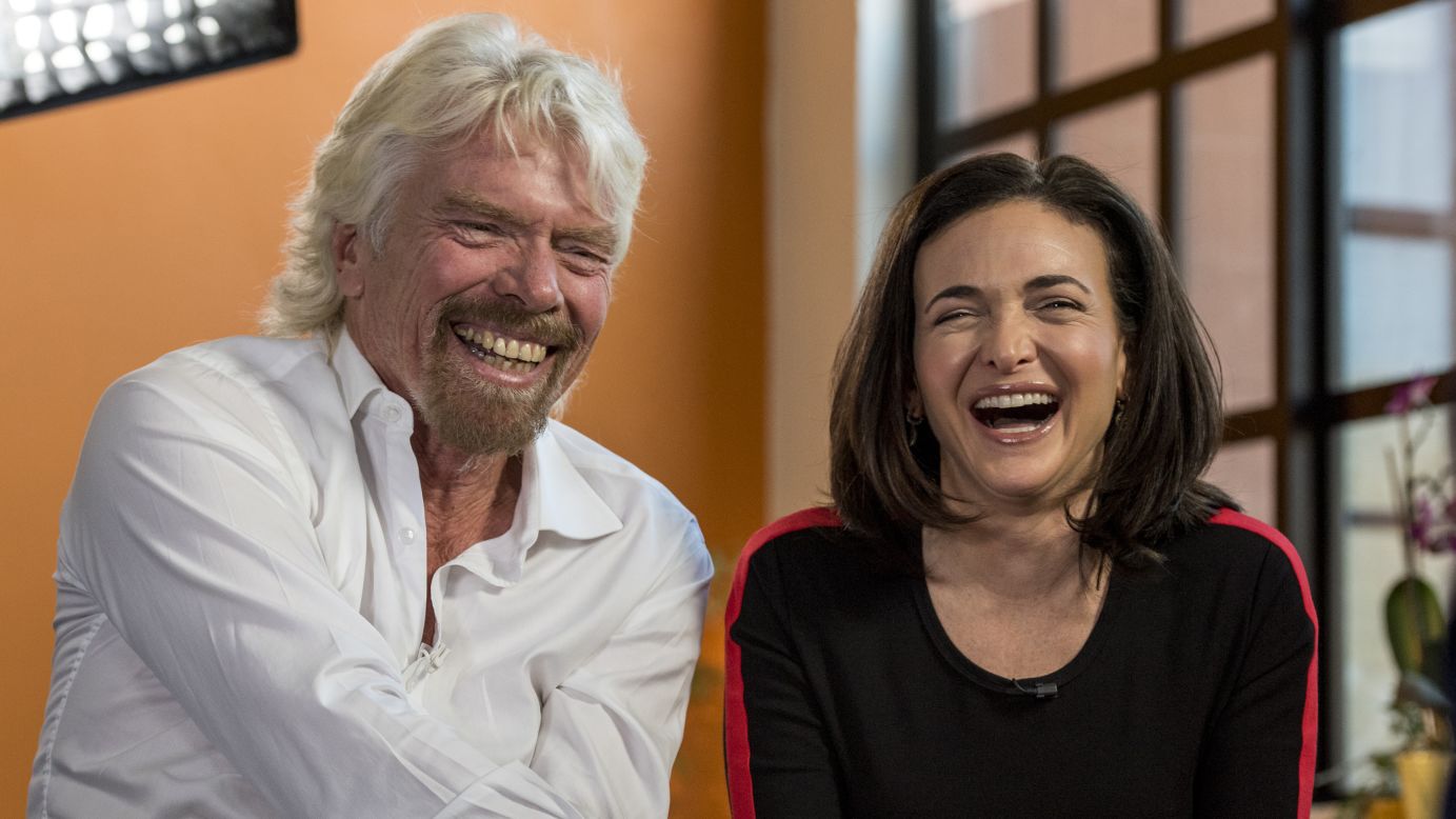 Virgin Group founder Richard Branson and Sheryl Sandberg, the chief operating officer of Facebook, have a laugh during a television interview in San Francisco on Thursday, April 23.