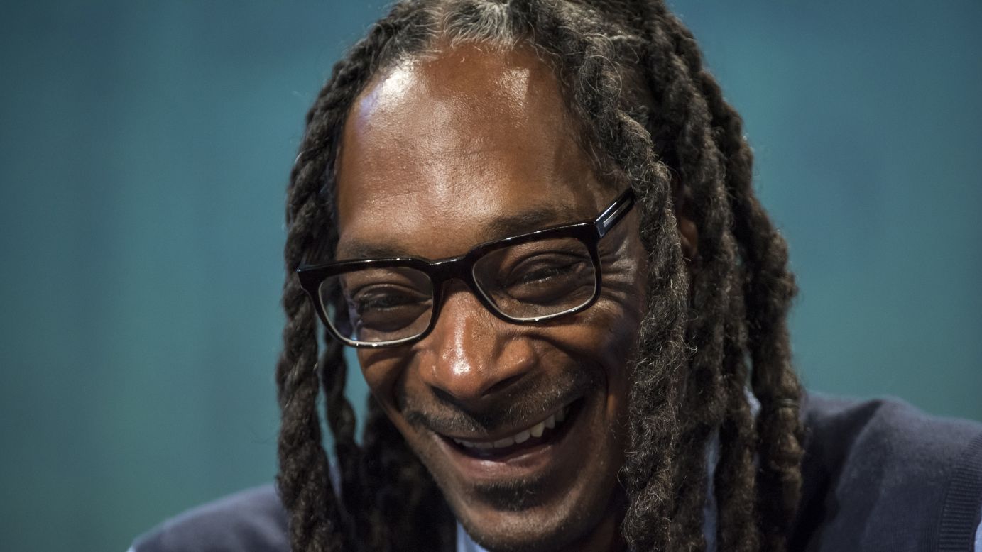 Rapper Snoop Dogg laughs during TechCrunch Disrupt, a technology conference in San Francisco, on Monday, September 21.