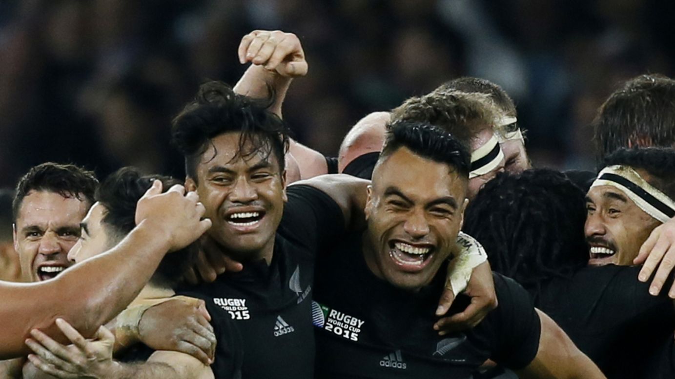 Rugby players from New Zealand celebrate after winning the Rugby World Cup final Saturday, October 31, in London. It was the second straight title for the "All Blacks," who also won the event in 2011.
