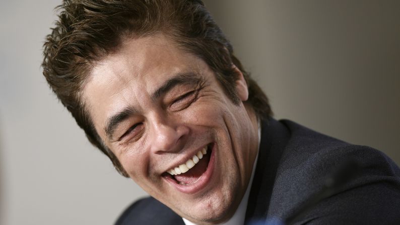 Actor Benicio Del Toro laughs during a press event for the film "Sicario" that was held Tuesday, May 19, at the Cannes Film Festival in France.