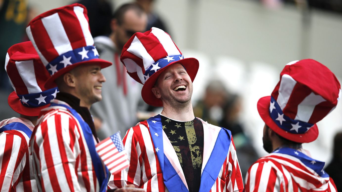 Rugby fans laugh together prior to a Rugby World Cup match between the United States and South Africa on Wednesday, October 7.