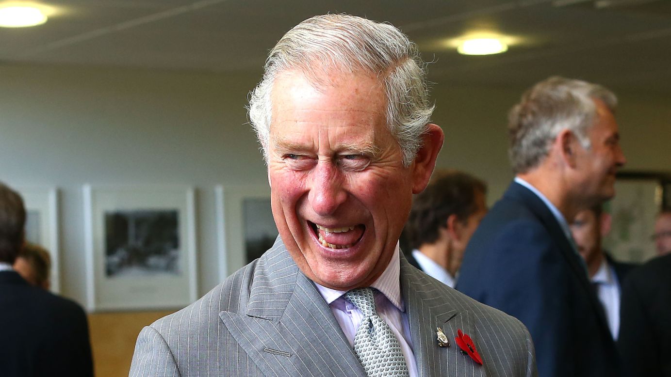 Britain's Prince Charles laughs while visiting a research institute in Nelson, New Zealand, on Saturday, November 7.