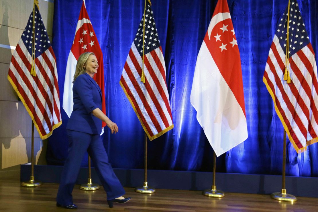 US Secretary of State Hillary Clinton walks on stage before speaking at Singapore Management University in Singapore on November 17, 2012.