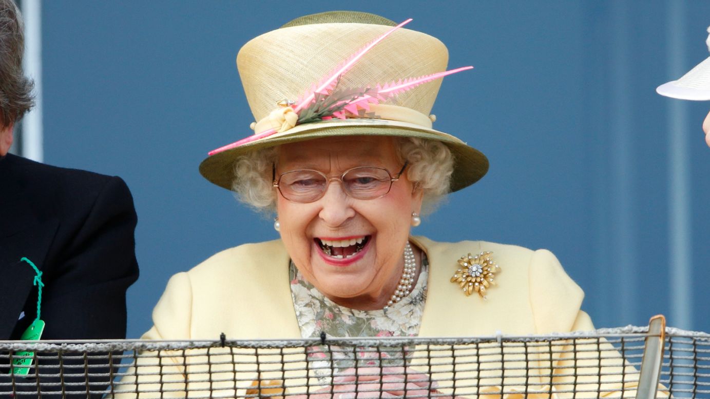 Britain's Queen Elizabeth II watches horse racing Saturday, June 6, in Epsom, England.