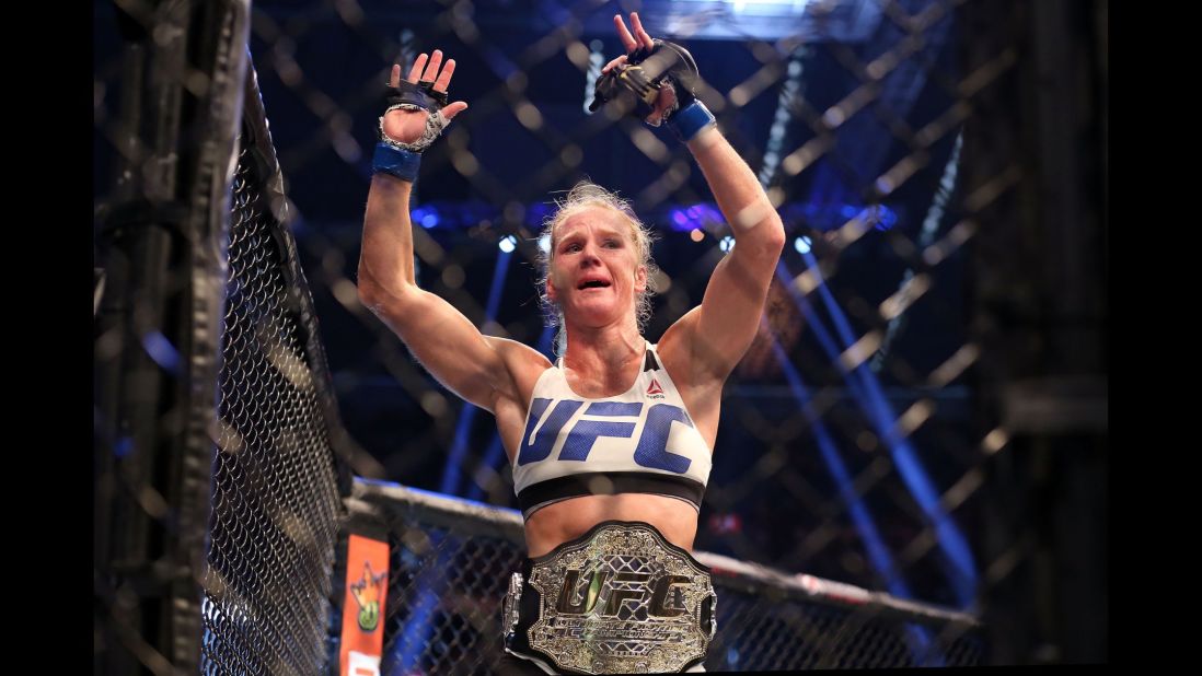 Holly Holm celebrates her stunning upset over Ronda Rousey after their UFC bantamweight championship bout Sunday, November 15, in Melbourne, Australia. Here's a look at Holm's life and career.