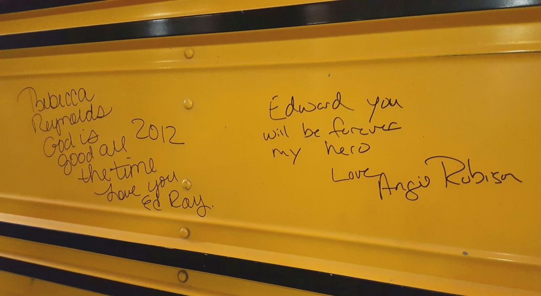 Victims of the school bus kidnapping signed the bus after driver Edward Ray's death in 2012. Ray was hailed as a hero for helping the 26 children escape. 
