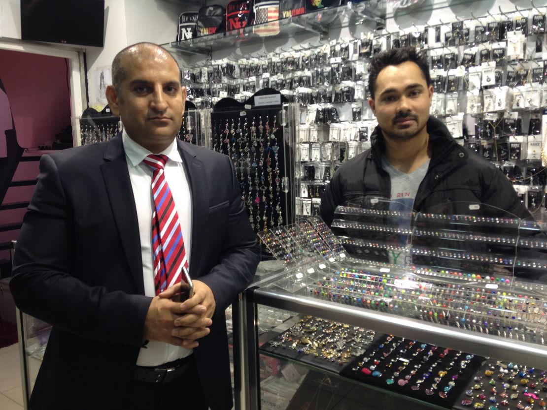 Wasim Akaram, left, and Rubal Singh at their tattoo shop.