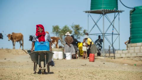 Residents of Nongoma, north west of Durban, that has been badly affected by the recent drought, prepare to collect water from a free water point sponsored by concerned citizens.