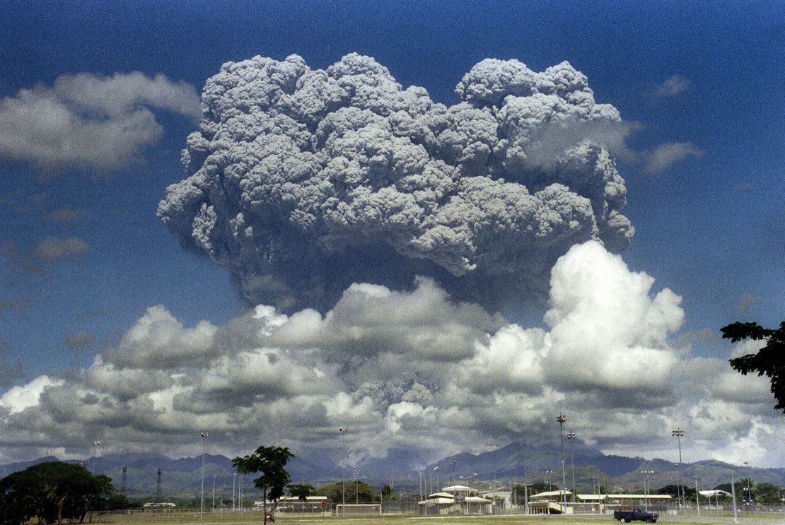A giant mushroom cloud of steam and ash exploding out of Mount Pinatubo volcano during its eruption in 1991.