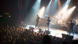 Eagles of Death Metal perform on stage at the Bataclan concert hall in Paris moments before four men armed with assault rifles stormed into the venue and opened fire on Friday, November 13.