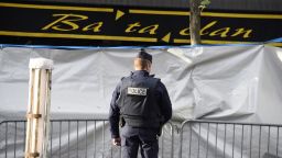 A police officer stands guard outside the Bataclan on Wednesday, November 18.
