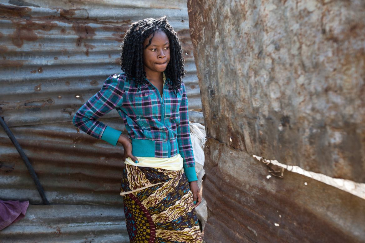 Flora, 19, is a high school student. She lives in Chamanculo C in Maputo with her mother, sister and niece. She shares a toilet with several other families living nearby.She says: "I hate using this toilet. Sometimes men peek over the fence. There is no privacy."