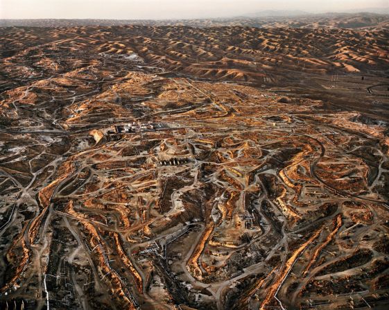 Burtynsky's Oil series challenges our awareness of energy consumption. 