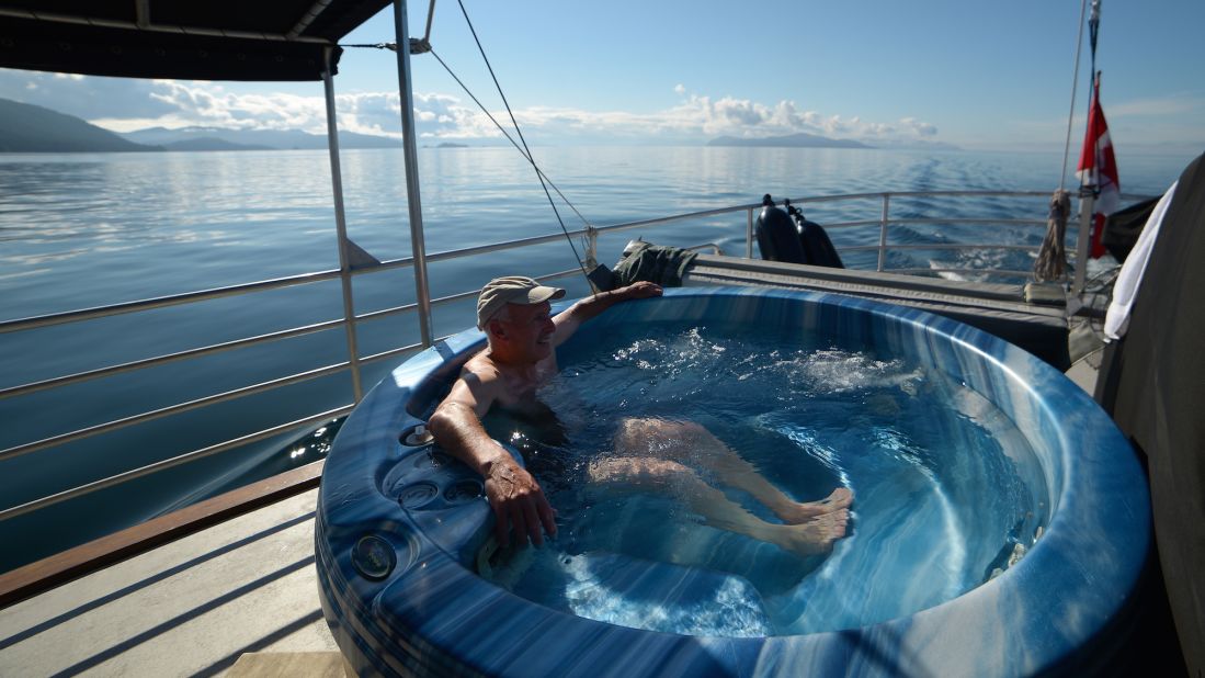 The $68,000 week-long trip heads through the western fjords of Canada's Great Bear Rainforest. Back on board there's no shortage of distractions, including an outdoor hot tub.