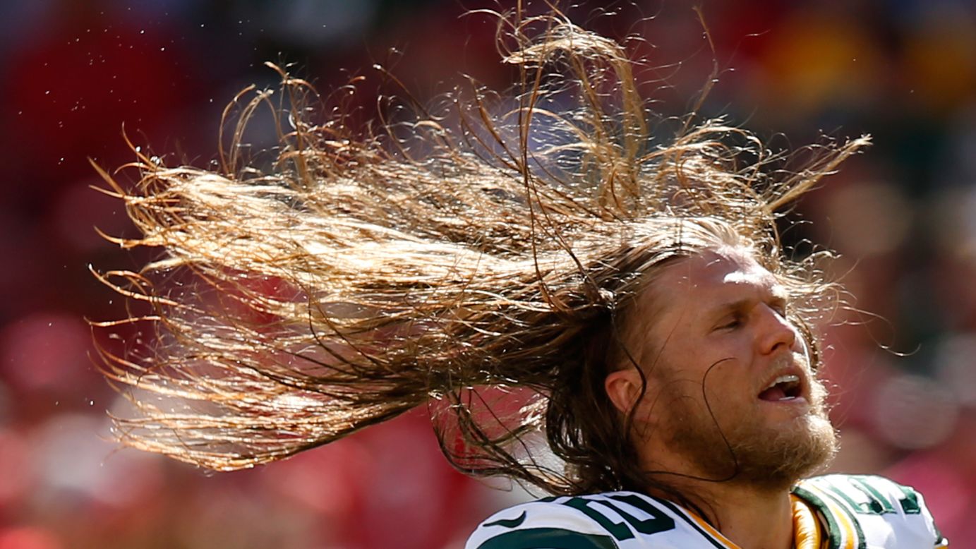 Green Bay Packers linebacker Clay Matthews whips his hair during an NFL game in Santa Clara, California, on Sunday, October 4.