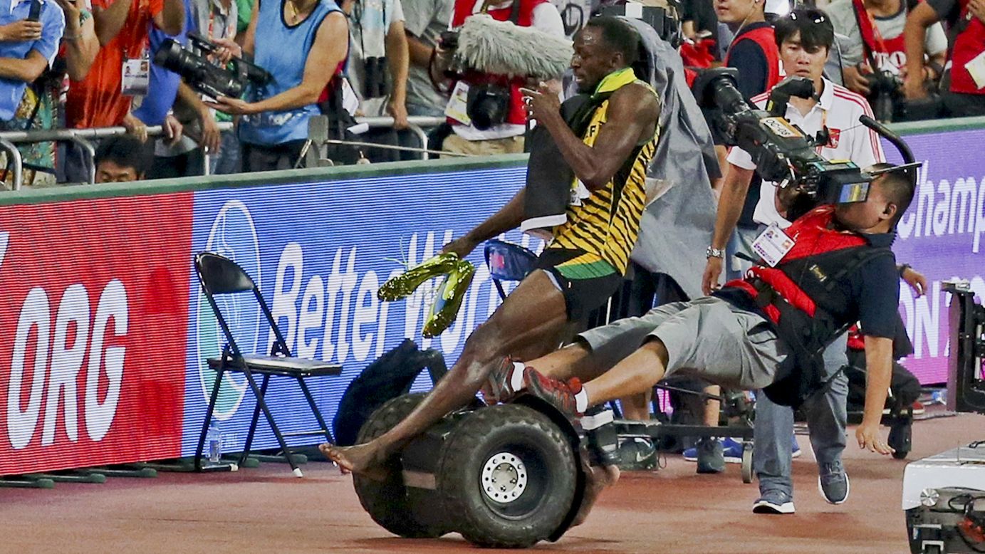 After winning the 200-meter final <a href="http://www.cnn.com/2015/08/30/sport/china-world-athletics-championships-wrap/" target="_blank">at the World Championships</a> in Beijing, Jamaican sprinter Usain Bolt is accidentally knocked over by a cameraman on a Segway. Neither man was hurt, however, and they later <a href="http://www.theguardian.com/sport/2015/aug/28/usain-bolt-segway-world-athletics-championships?CMP=share_btn_tw" target="_blank" target="_blank">shook hands on the medal stand.</a>