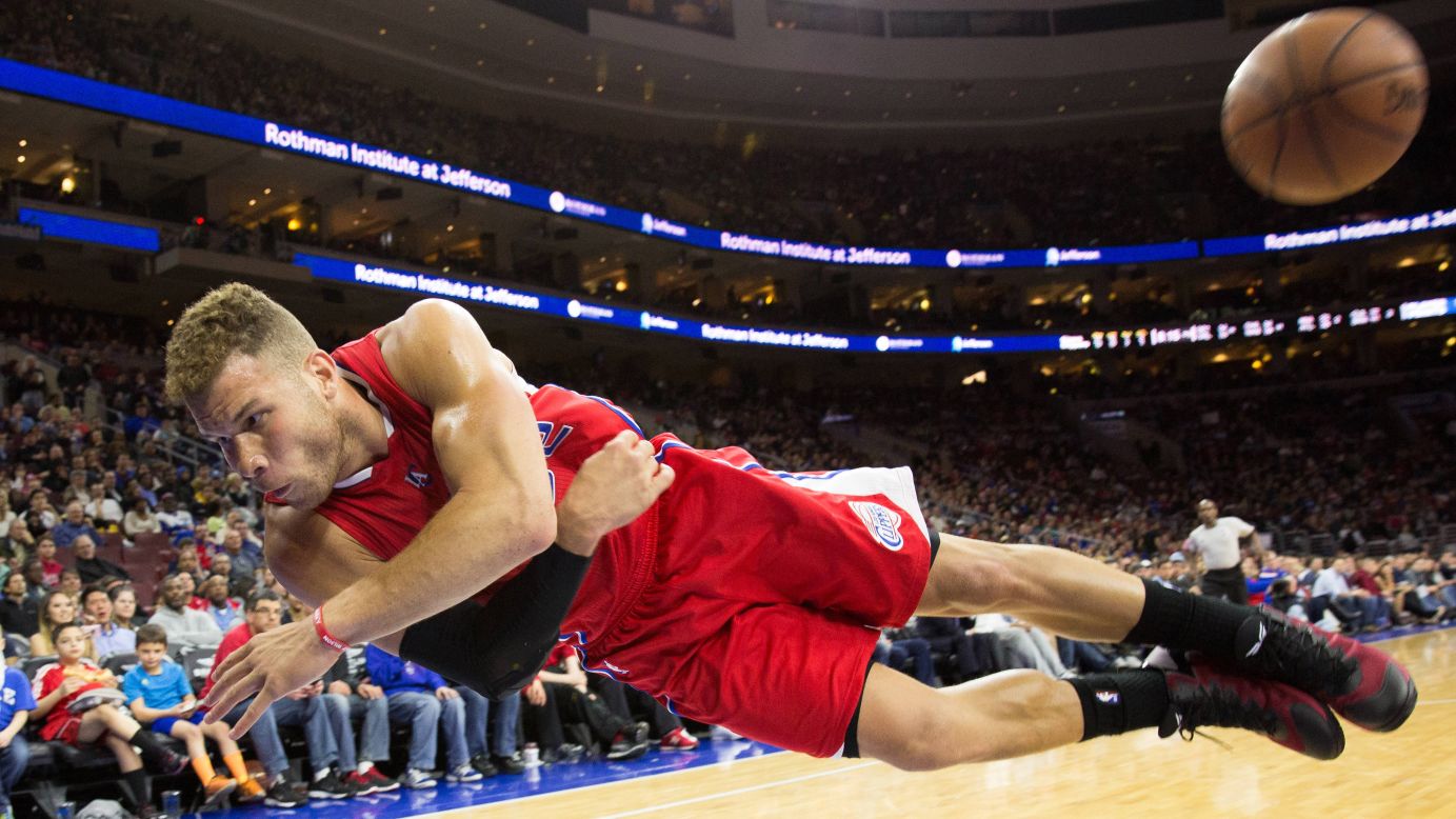 Los Angeles Clippers forward Blake Griffin dives to save a loose ball Friday, March 27, in Philadelphia.