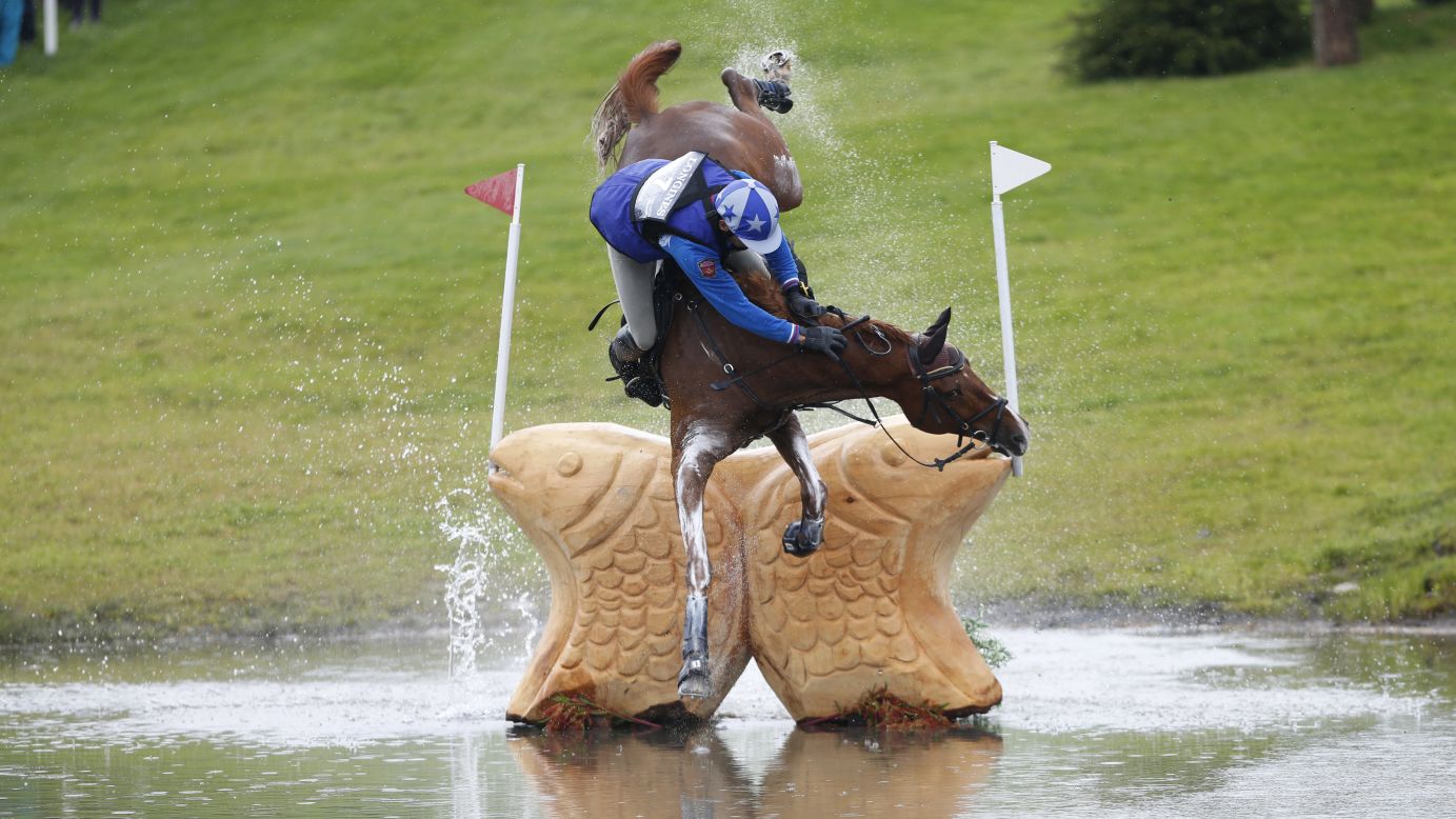 Mikhail Nastenko falls off his horse Reistag during an equestrian event in Blair Atholl, Scotland, on Saturday, September 12.