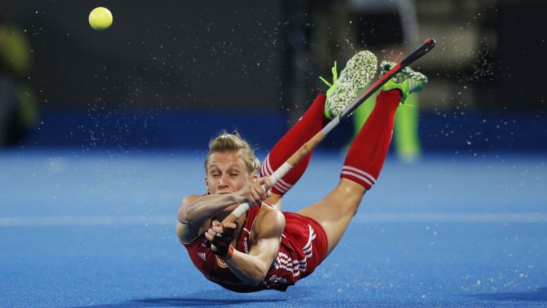 England's Alex Danson falls to the ground Wednesday, August 26, during a game against Germany at the EuroHockey Nations Championship. Danson had three goals in the 4-1 victory, and England -- the tournament hosts -- eventually won the tournament. Danson was named Player of the Tournament.