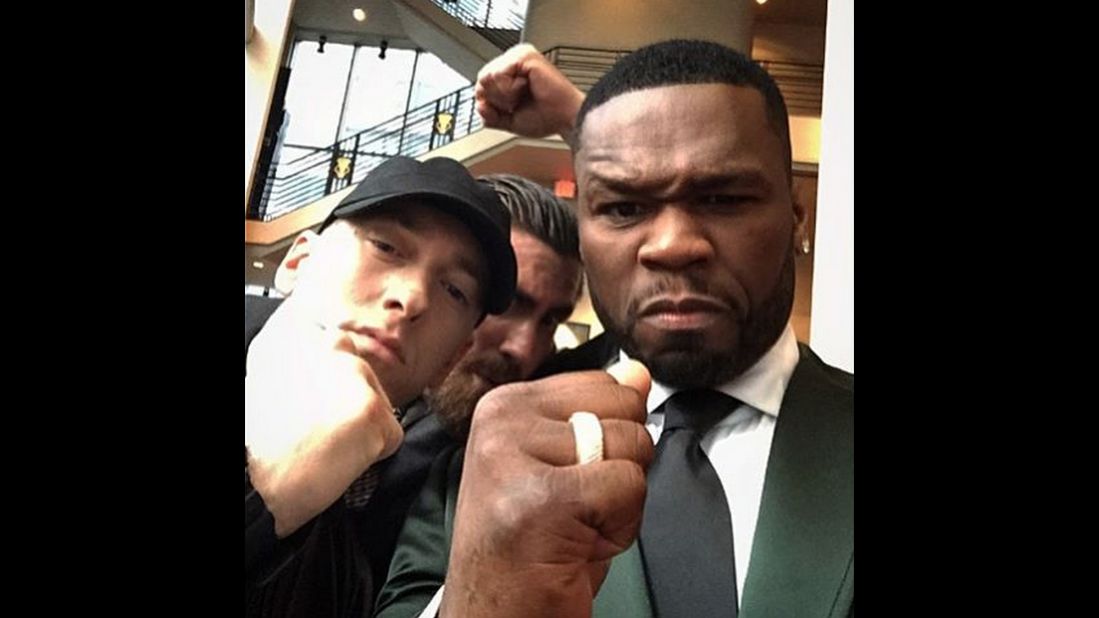 That's actor Jake Gyllenhaal behind rappers Eminem and 50 Cent in this photo that 50 Cent <a href="https://instagram.com/p/5YQv4zsL_Q/" target="_blank" target="_blank">posted to Instagram</a> on Monday, July 20. They were putting their fists up to promote "Southpaw," a boxing movie starring Gyllenhaal and 50.