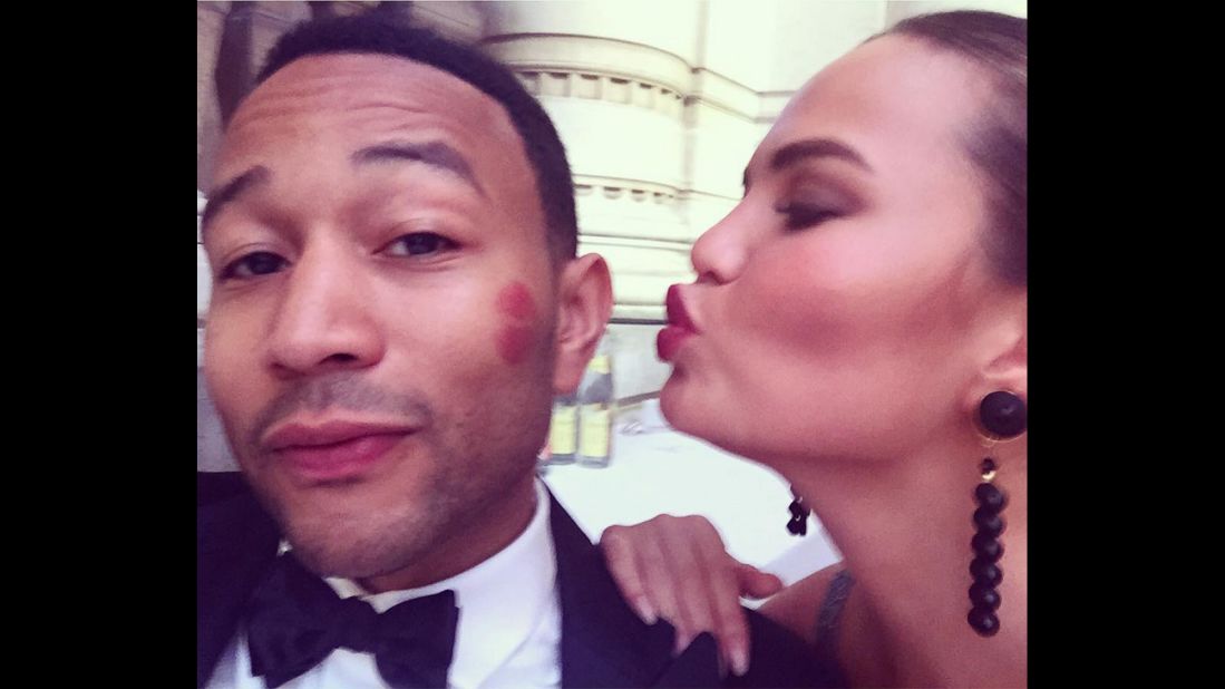 Singer John Legend <a href="https://instagram.com/p/4zrmICkSjQ/" target="_blank" target="_blank">gets a kiss</a> from his wife, model Chrissy Teigen, on Monday, July 6.
