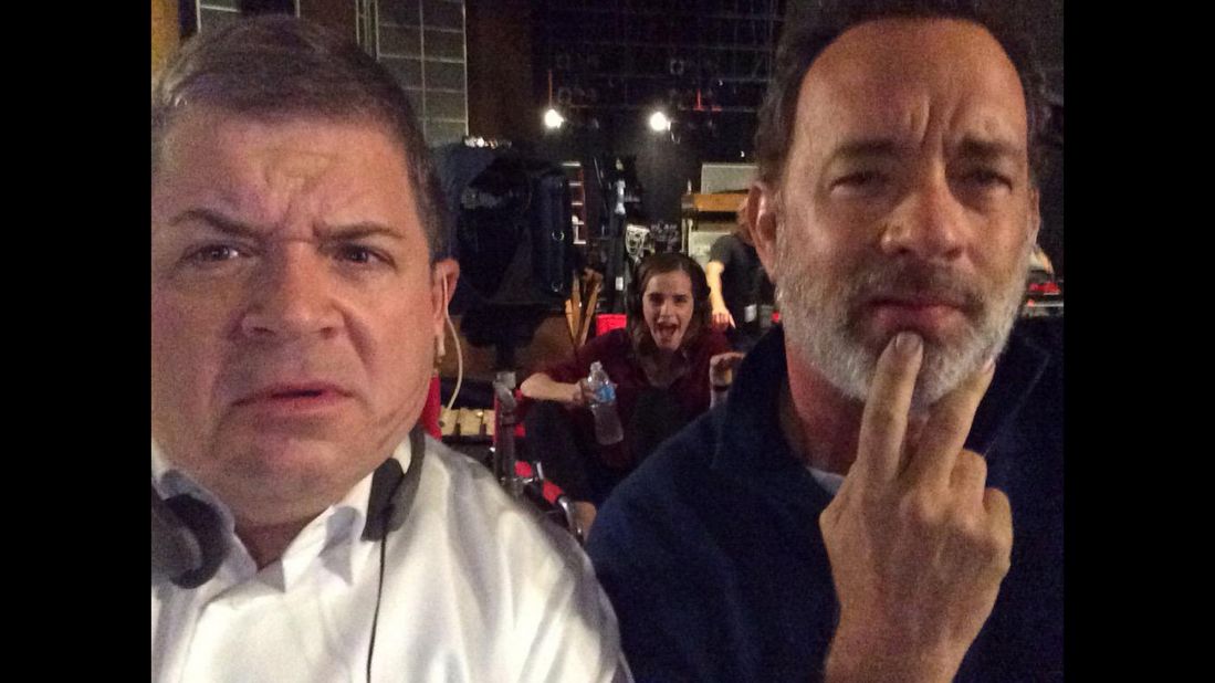 "Watching the #GOPDebate on set and we're all very confused," <a href="https://twitter.com/pattonoswalt" target="_blank" target="_blank">tweeted comedian Patton Oswalt,</a> left, with actor Tom Hanks on Wednesday, September 16. Hanks and Oswalt -- and Emma Watson, in the background -- were filming the movie "The Circle."