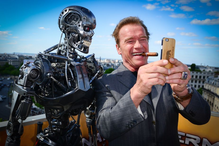 Actor Arnold Schwarzenegger takes a selfie with a "Terminator" robot while he was in Paris promoting the franchise's latest movie on Friday, June 19. <a href="http://www.cnn.com/2015/06/25/living/gallery/tbt-arnold-schwarzenegger/index.html" target="_blank">#tbt: See Schwarzenegger before he was the "Terminator"</a>