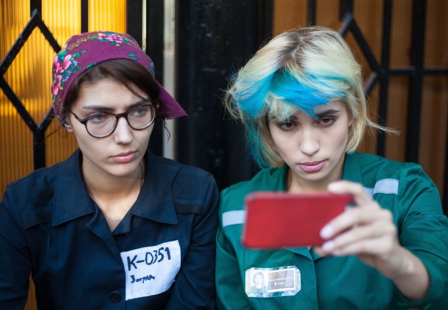 Nadezhda Tolokonnikova, one of the founding members of the punk band Pussy Riot, takes a selfie with friend Katrin Nenasheva after they were released from a Moscow police station on Friday, June 12. They had been detained for staging a protest in support of female prisoners.