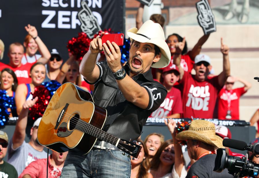 Country singer Brad Paisley makes a funny face while performing live on the set of ESPN's "College GameDay" on Saturday, September 5.
