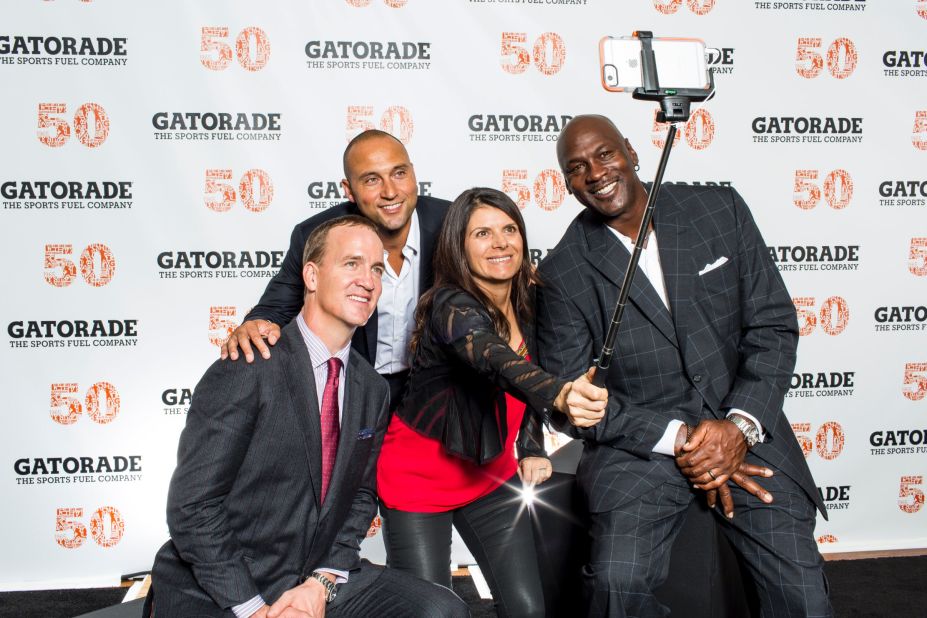 From left, sports icons Peyton Manning, Derek Jeter, Mia Hamm and Michael Jordan take a selfie together at Gatorade's 50th anniversary celebration on Saturday, January 31. 